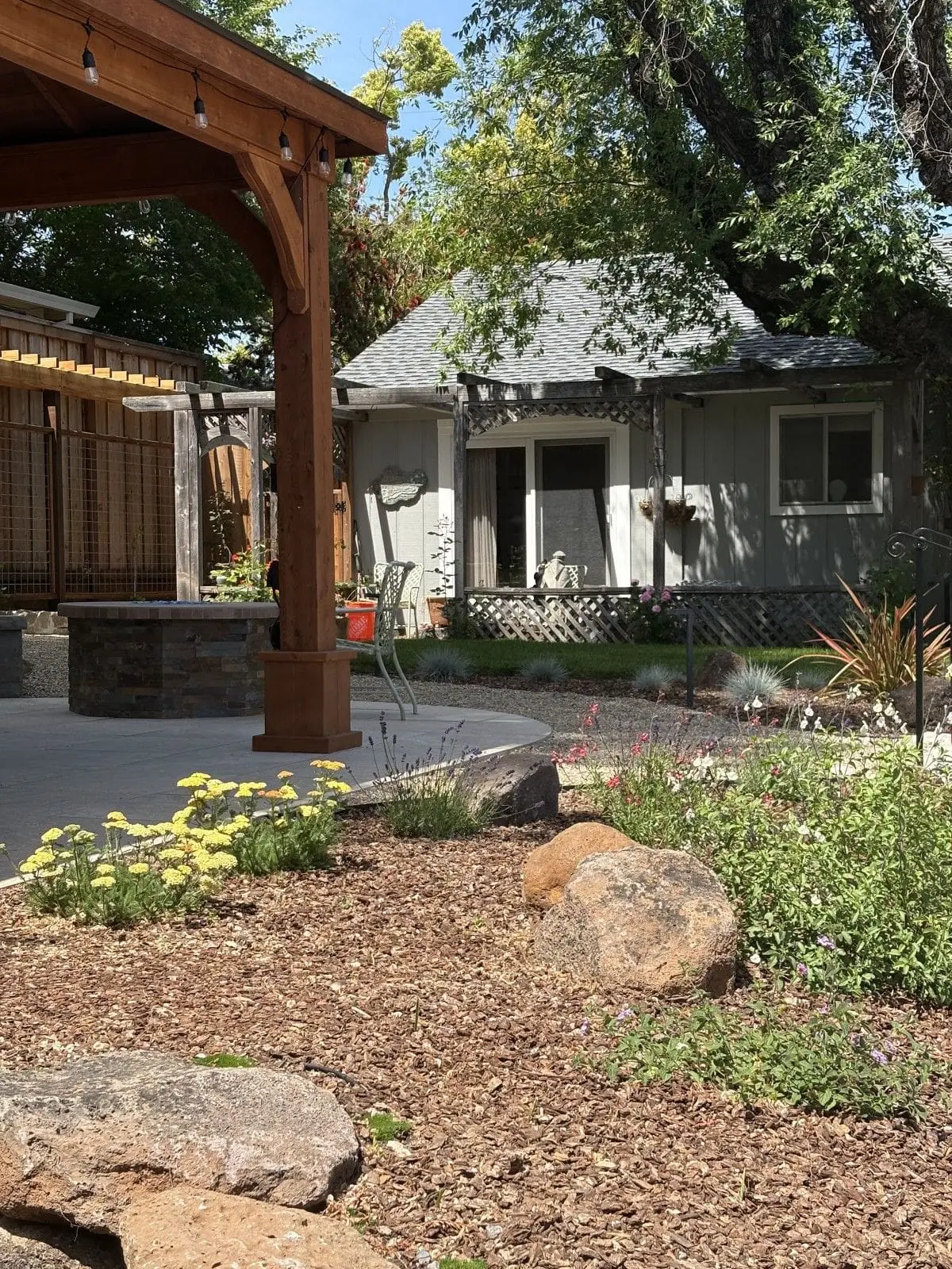 Custom outdoor carpentry and wooden patio structure installation for a backyard in Napa, CA.