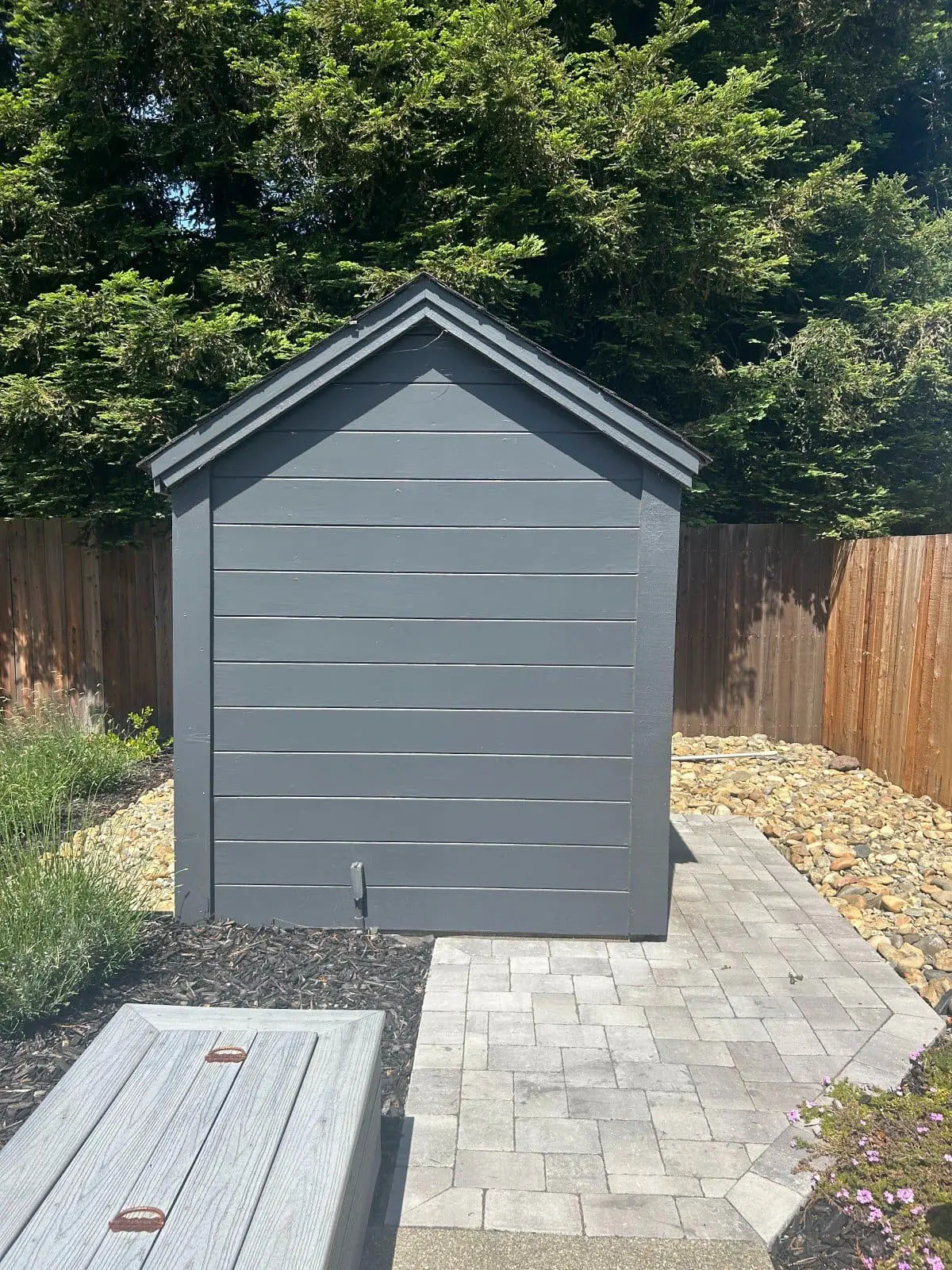 Professional custom carpentry service in Napa, CA featuring a modern gray shed build by Keystone Yards.