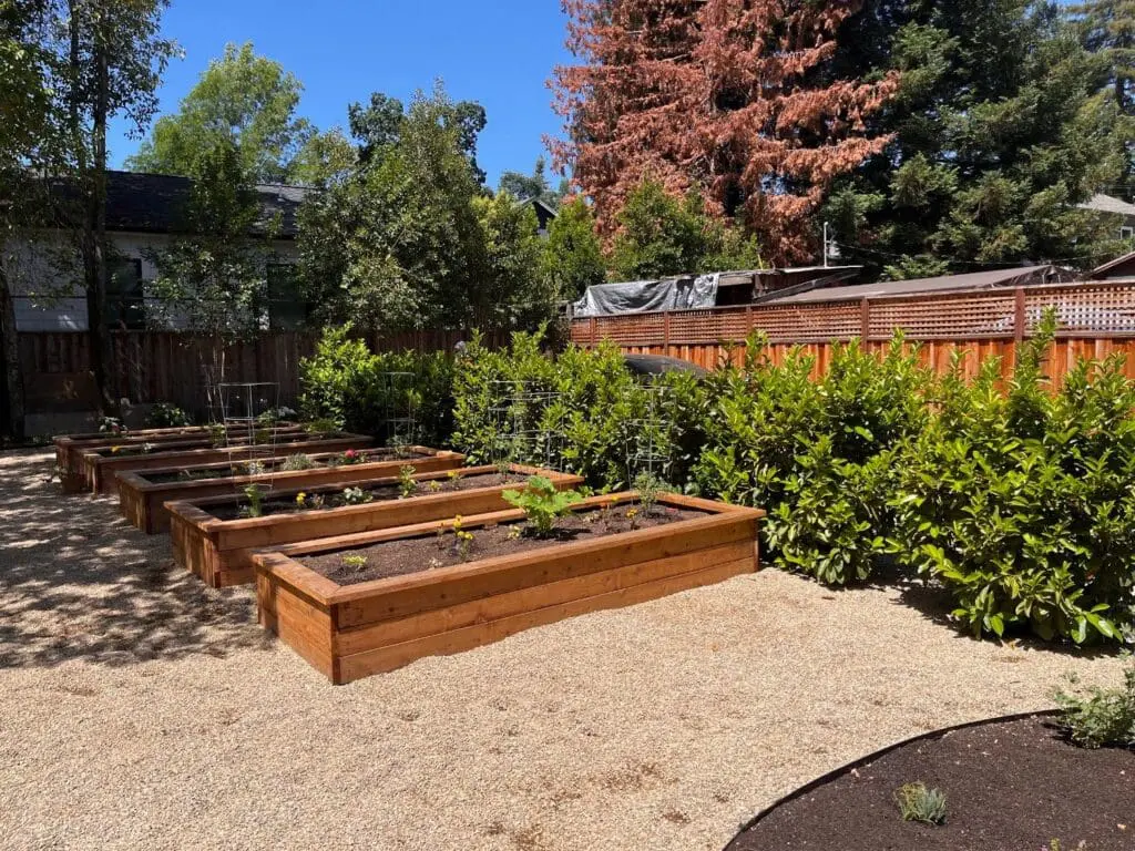 Custom wood-framed raised garden beds and outdoor carpentry service by Keystone Yards in Napa, CA.