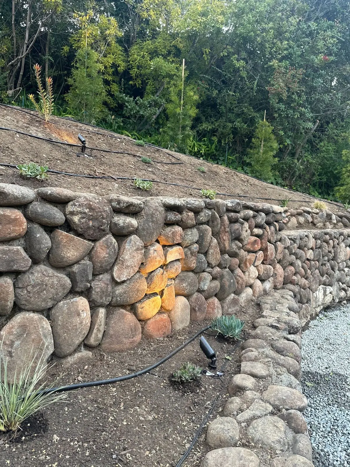 Custom stone retaining wall and masonry installation by Keystone Yards in Napa, CA