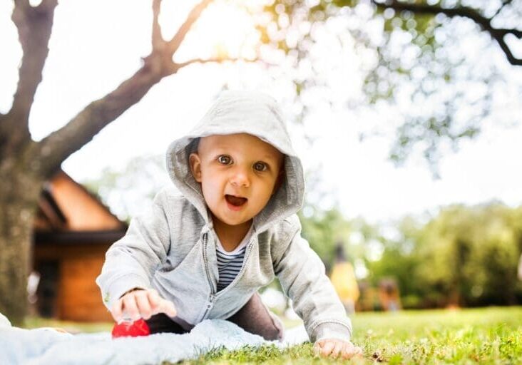 Kid-friendly outdoor space with soft grass and safe backyard play area